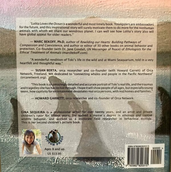SIGNED COPY OF "Lolita Loves the Ocean: The Story of a Wild Orca" by Gina Sequiera